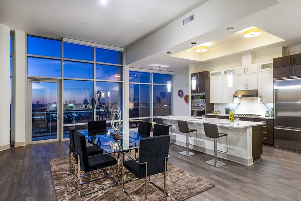 Dining room with elegant decor and modern furnishings at Latitude Med Center Apartments, luxury living space in a desirable location