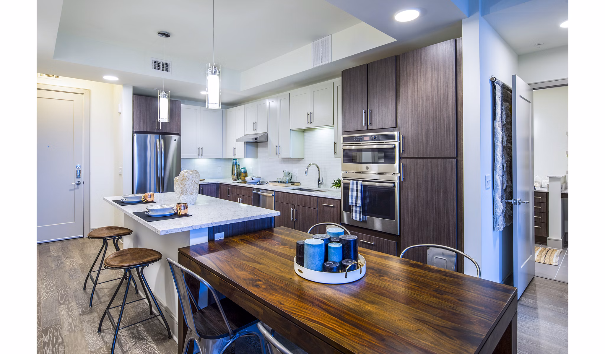 Dining room featuring elegant decor and large windows at Latitude Med Center Apartments, offering luxury living in Houston