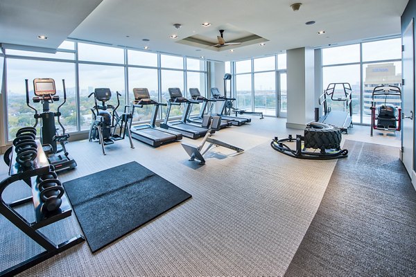 State-of-the-art fitness center at Latitude Med Center Apartments, Houston, featuring modern equipment and spacious workout areas