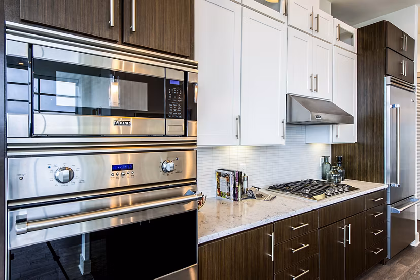 Modern kitchen with high-end appliances at Latitude Med Center Apartments