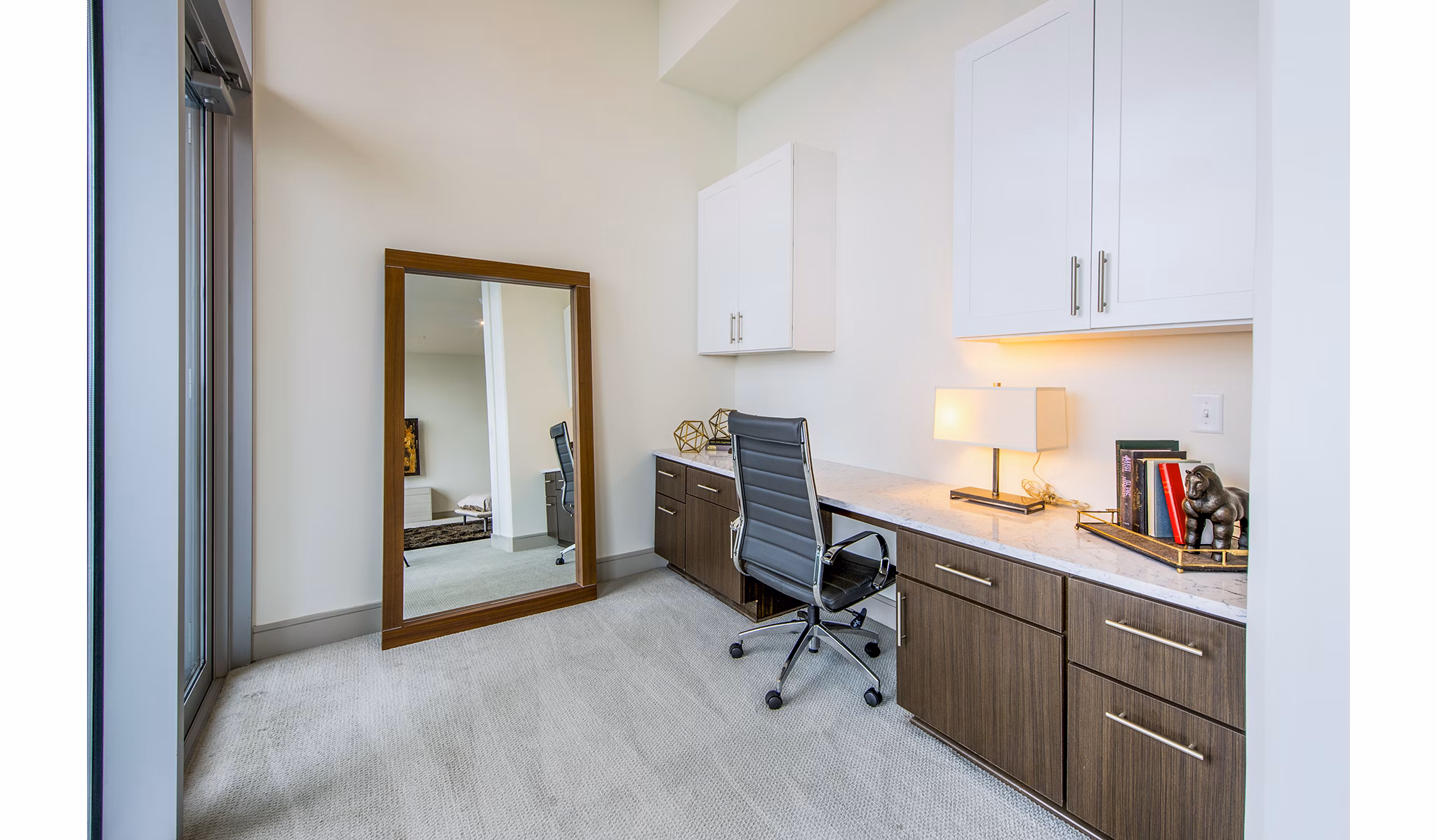 Home office with modern furnishings at Latitude Med Center Apartments, ideal for remote work in luxury Houston living