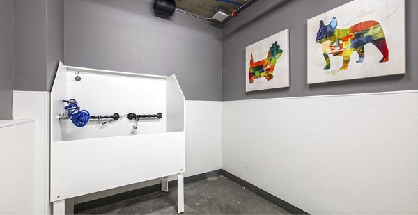 Convenient dog wash station at Zig Apartments, perfect for pet-friendly luxury living in the heart of the city