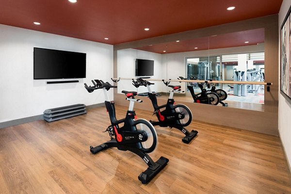 State-of-the-art fitness center featuring modern equipment at Avila Apartments