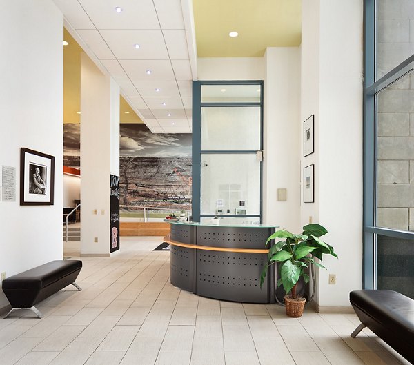 Clubhouse featuring modern seating and stylish decor at SoCam 290 Apartments, offering a luxury gathering space in Greenville