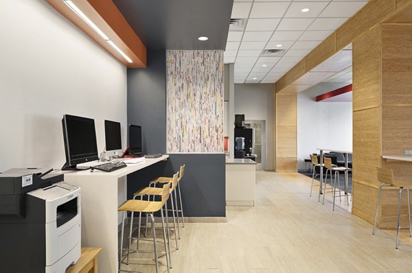 Expansive clubhouse featuring modern furnishings at SoCam 290 Apartments