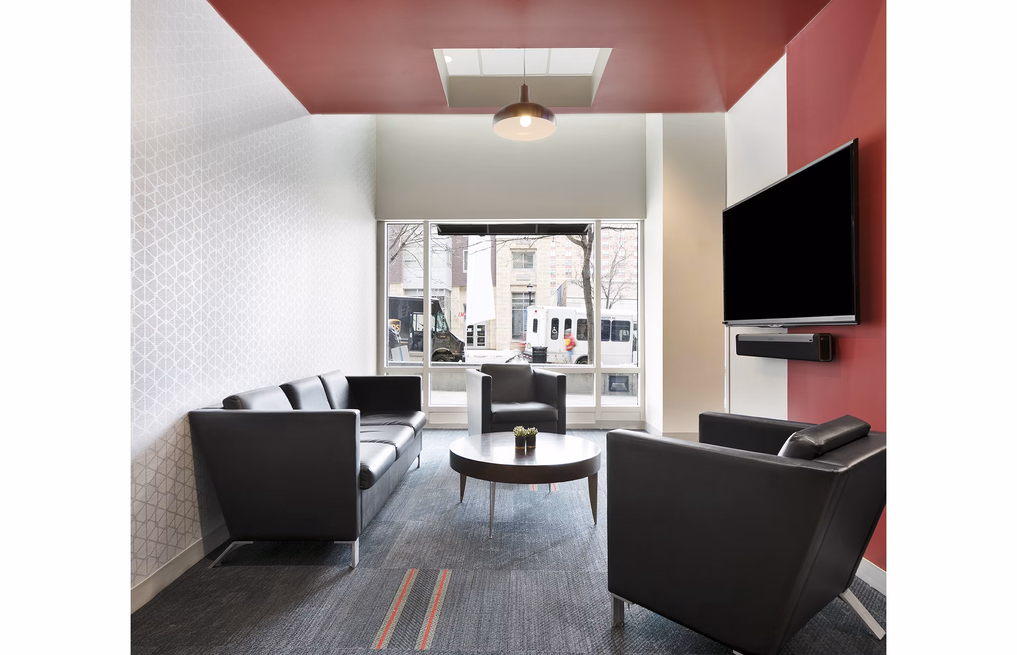 Modern clubhouse with cozy seating and community kitchen at SoCam 290 Apartments, perfect for social gatherings and events