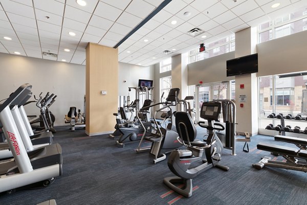 fitness center at SoCam 290 Apartments