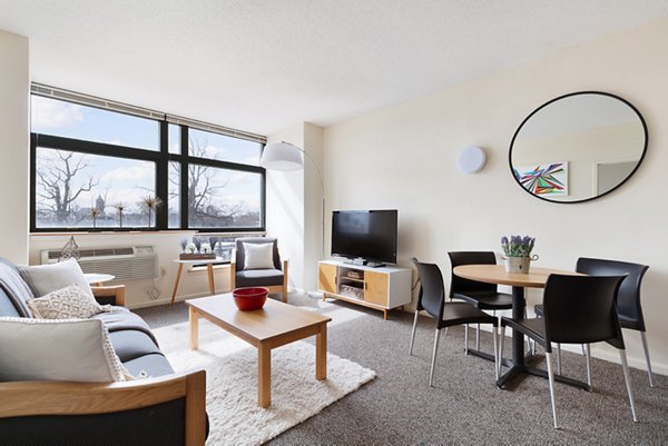Spacious living room with modern decor at SoCam 290 Apartments, designed for luxury living and comfort