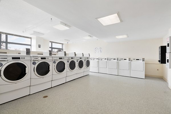 laundry center at SoCam 290 Apartments