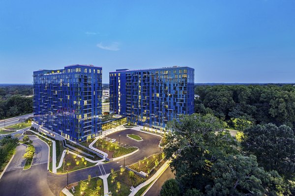 Exo Apartments: Luxury high-rise with sleek modern architecture in vibrant urban setting