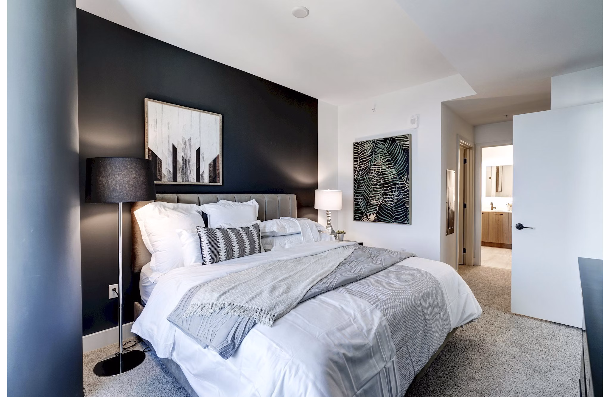 Bedroom featuring modern design and cozy atmosphere in Exo Apartments