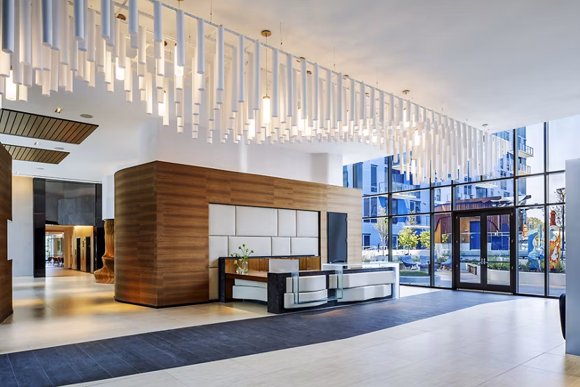 Stylish clubhouse with modern decor at Exo Apartments, offering a community-centered space for residents