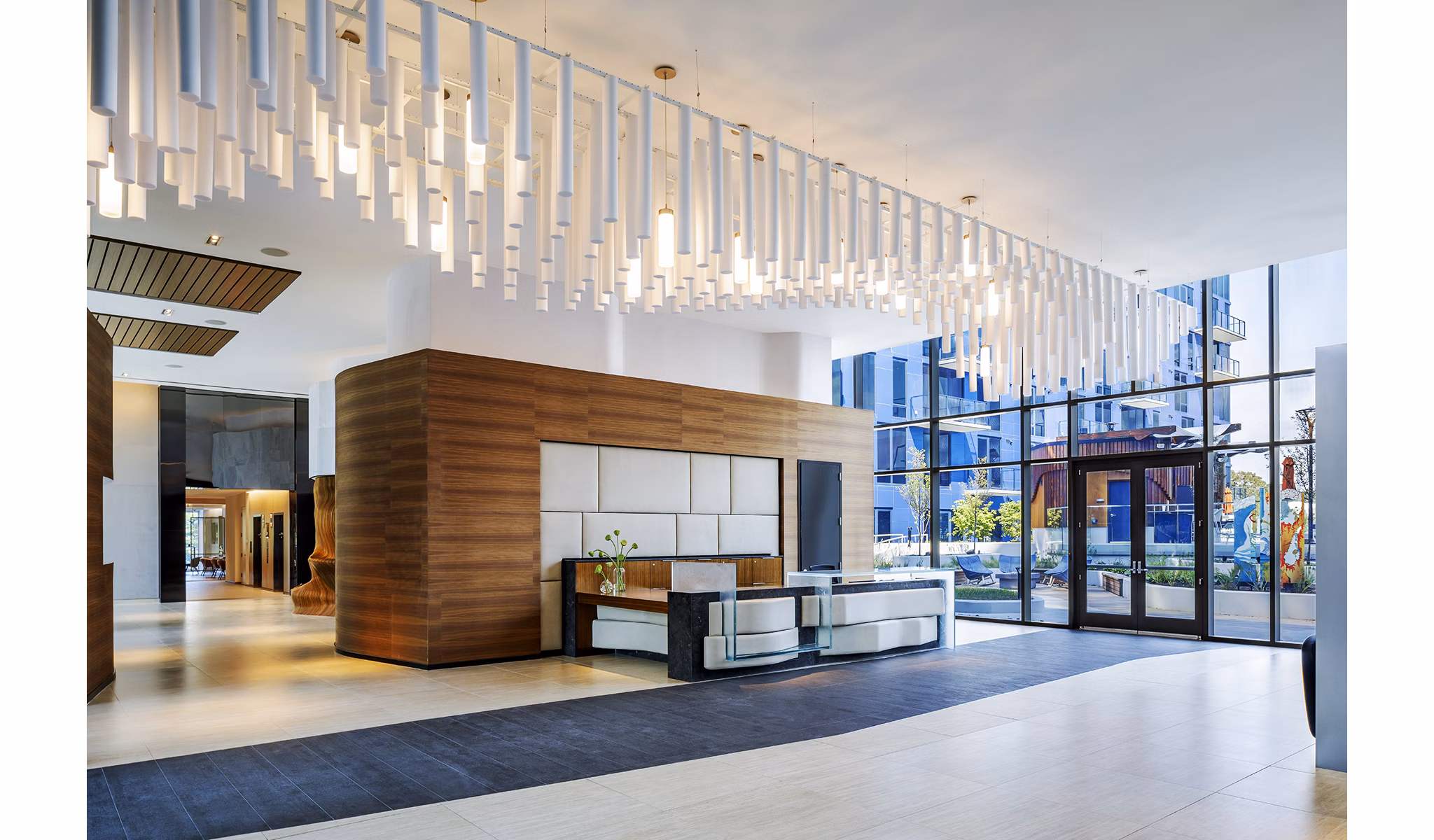 Stylish clubhouse with modern decor at Exo Apartments, offering a community-centered space for residents