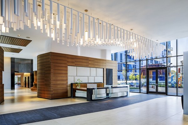 Stylish clubhouse with modern decor at Exo Apartments, offering a community-centered space for residents