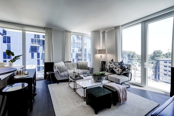 Spacious living room with modern decor in Exo Apartments, luxury living in the heart of the city
