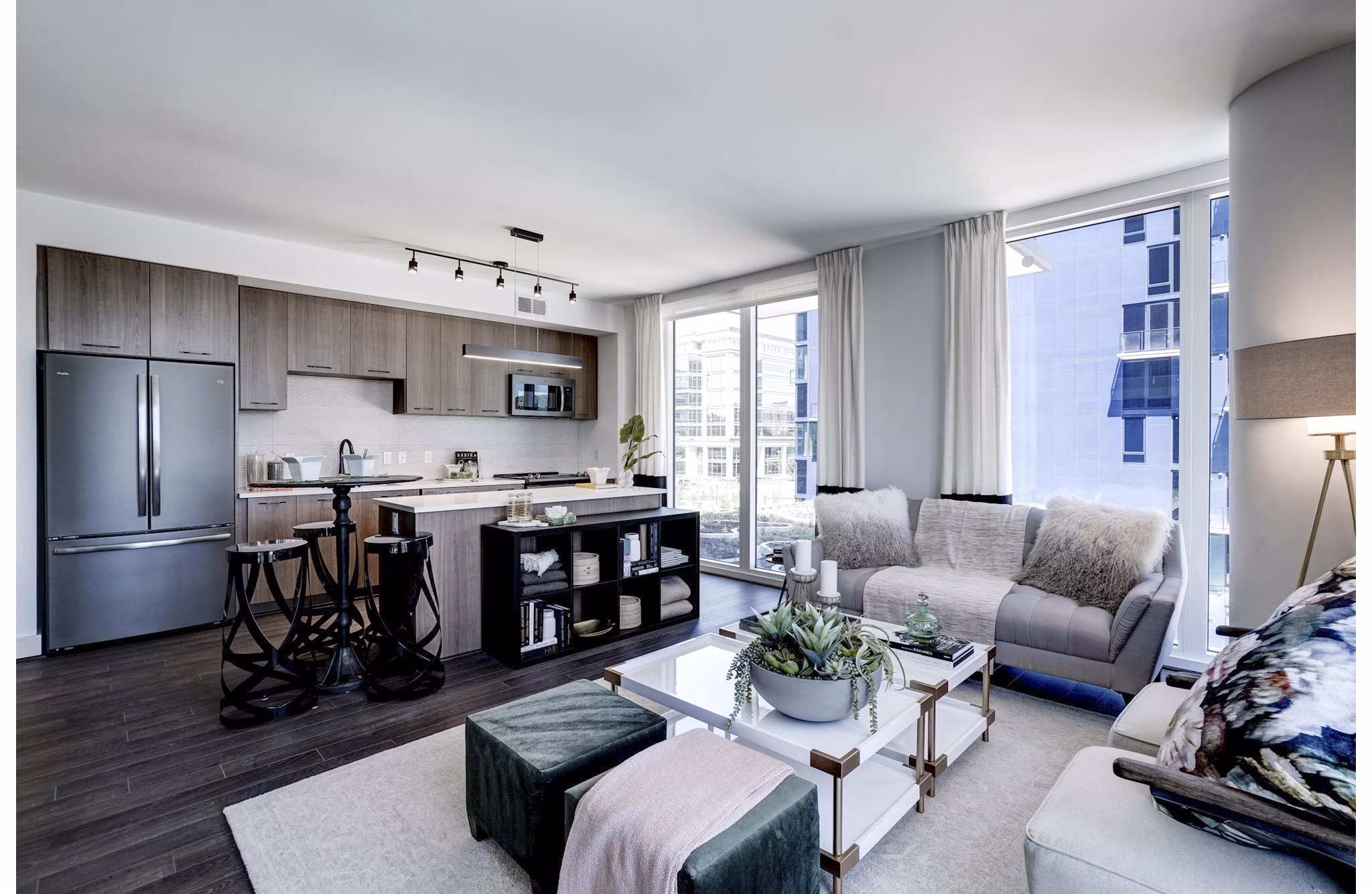Spacious living room featuring modern decor in Exo Apartments, luxury residence