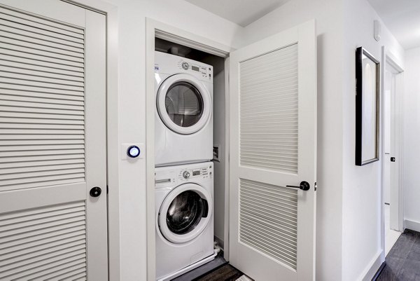 Exo Apartments: In-unit washer and dryer in modern high-rise apartments