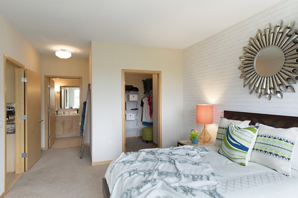Ellipse on Excelsior: Elegant bedroom with modern furnishings in luxury apartment