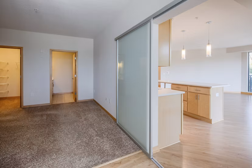 Cozy bedroom with modern decor at Ellipse on Excelsior luxury apartments