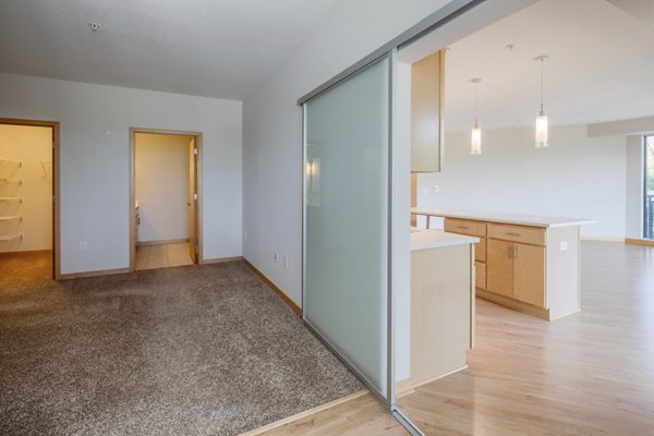 Cozy bedroom with modern decor at Ellipse on Excelsior luxury apartments
