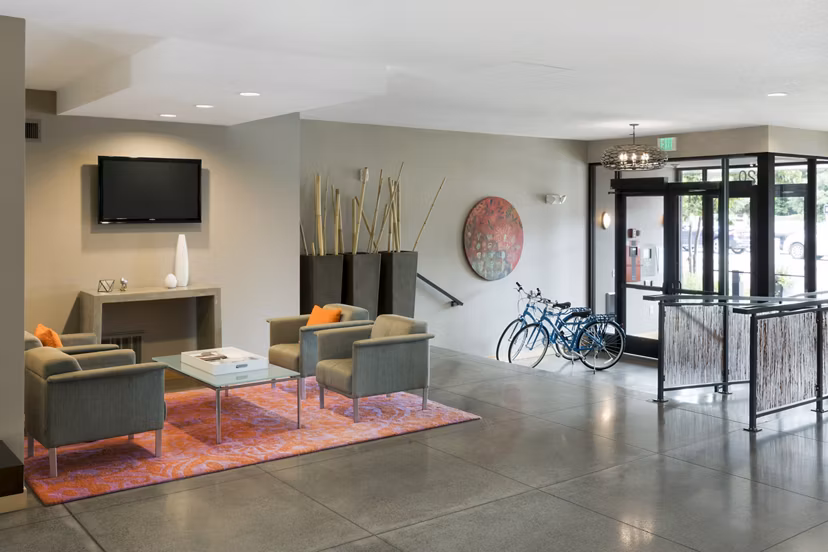 Ellipse on Excelsior: Modern clubhouse featuring lounge seating and entertainment areas