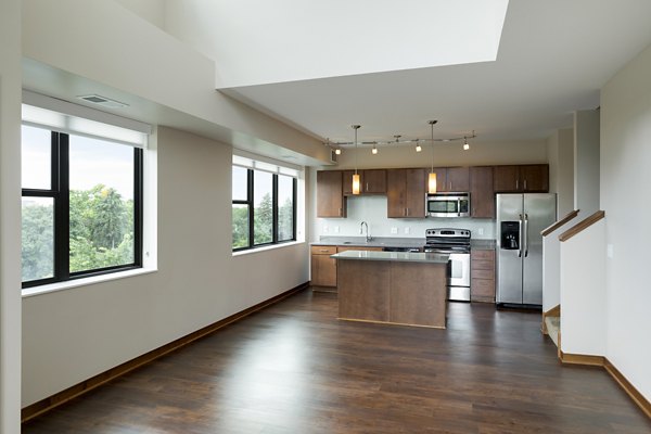 Dining room featuring open concept design and modern furnishings in Ellipse on Excelsior luxury apartments