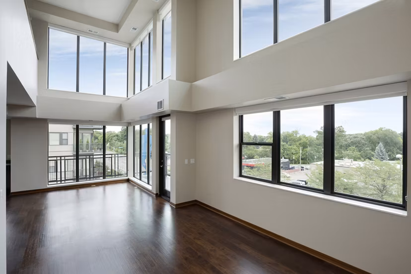 Stylish living room with contemporary furnishings at Ellipse on Excelsior luxury apartments
