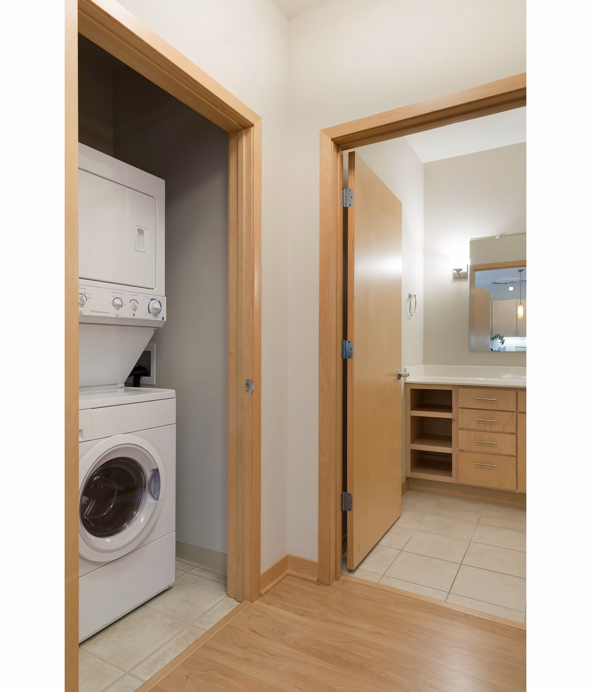 Laundry room featuring modern appliances at Ellipse on Excelsior apartments