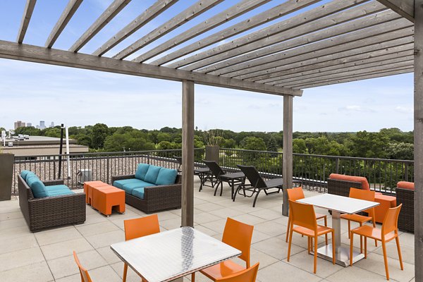 Patio area with stylish seating at Ellipse on Excelsior, a Greystar luxury apartment community