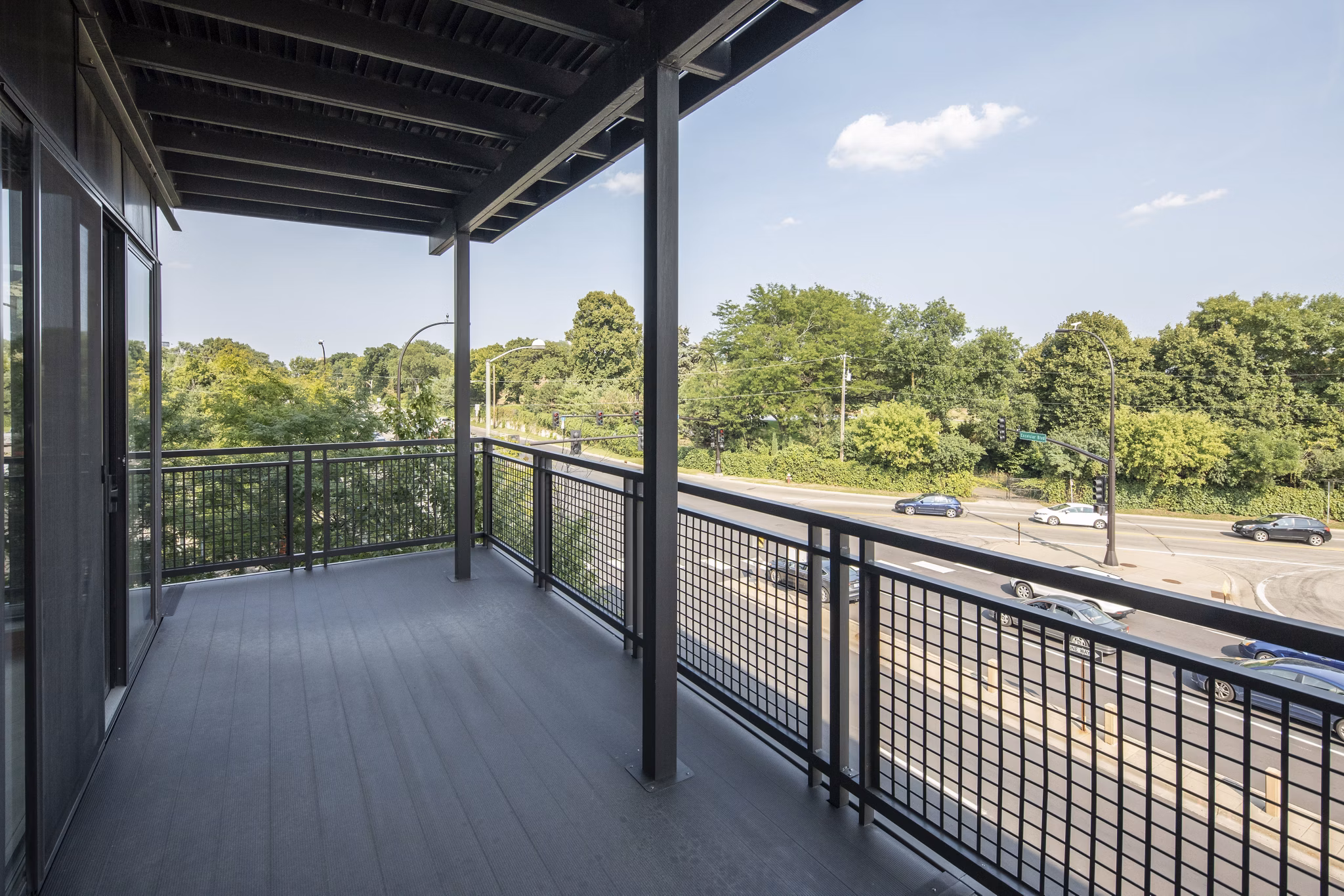 Chic outdoor patio area with stylish seating at Ellipse on Excelsior luxury apartments