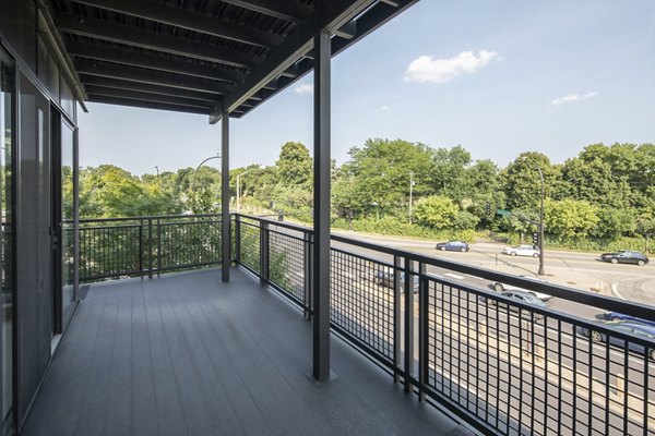 Chic outdoor patio area with stylish seating at Ellipse on Excelsior luxury apartments