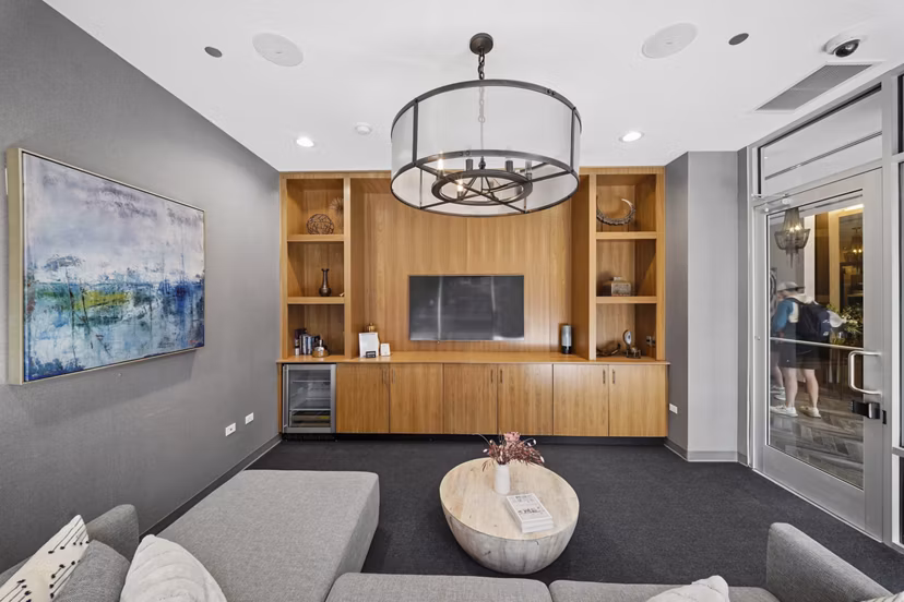 Elegant clubhouse with modern design at Luxe on Chicago Apartments, perfect for social gatherings and events