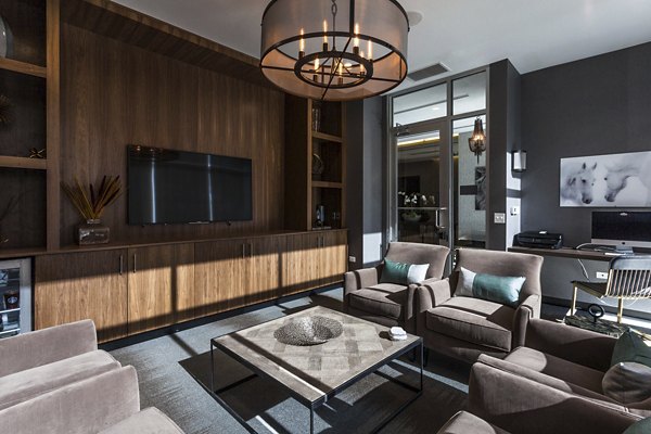 Elegant clubhouse with modern design at Luxe on Chicago Apartments, perfect for social gatherings and events