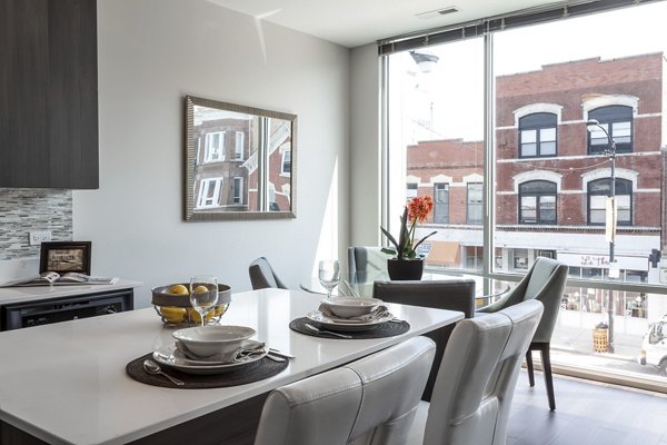 Modern kitchen with high-end appliances in Luxe on Chicago Apartments offering luxury living