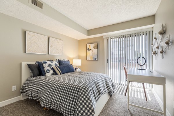 bedroom at Reflections on 92nd Apartments