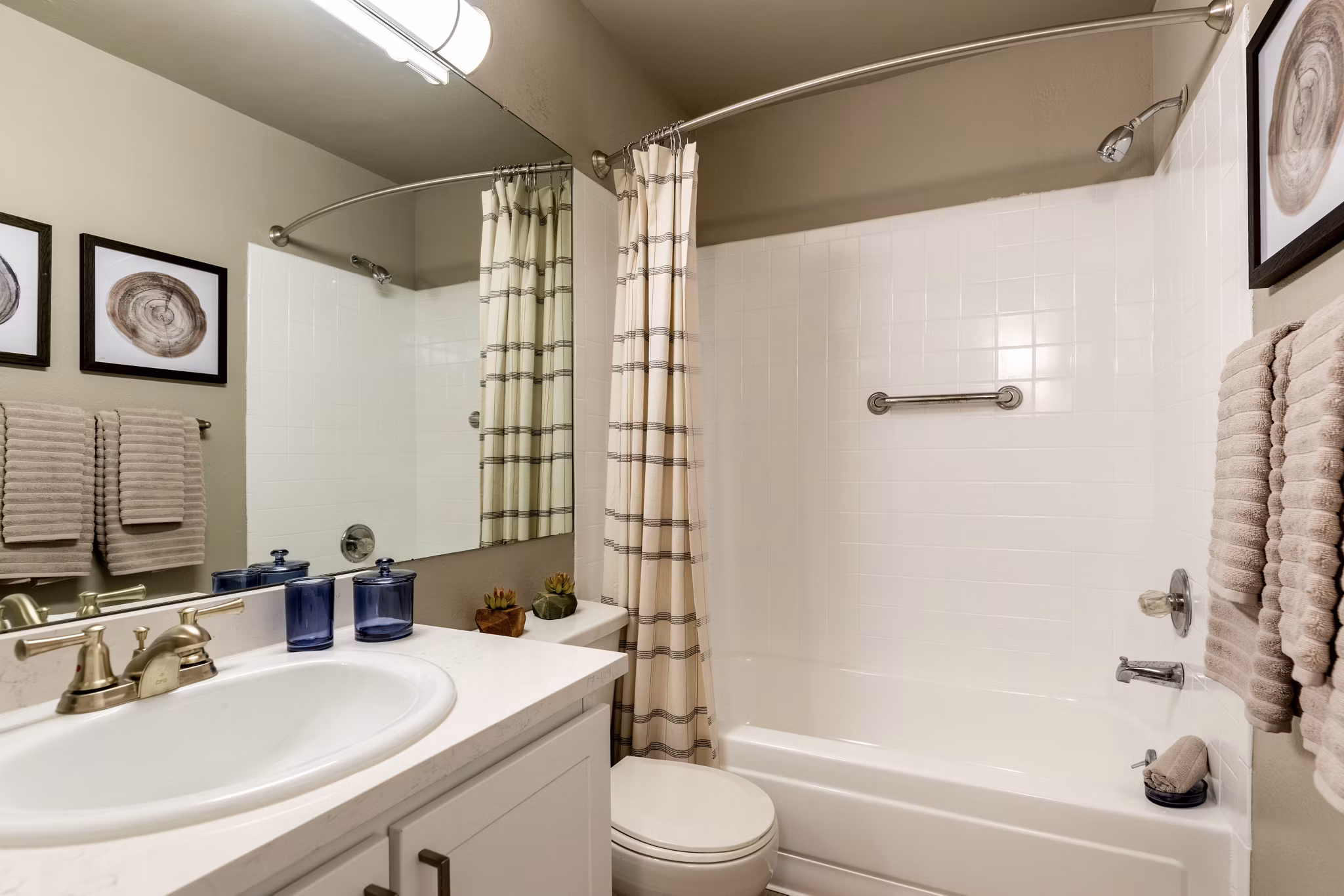 Bedroom featuring elegant design and cozy furnishings at Reflections on 92nd Apartments