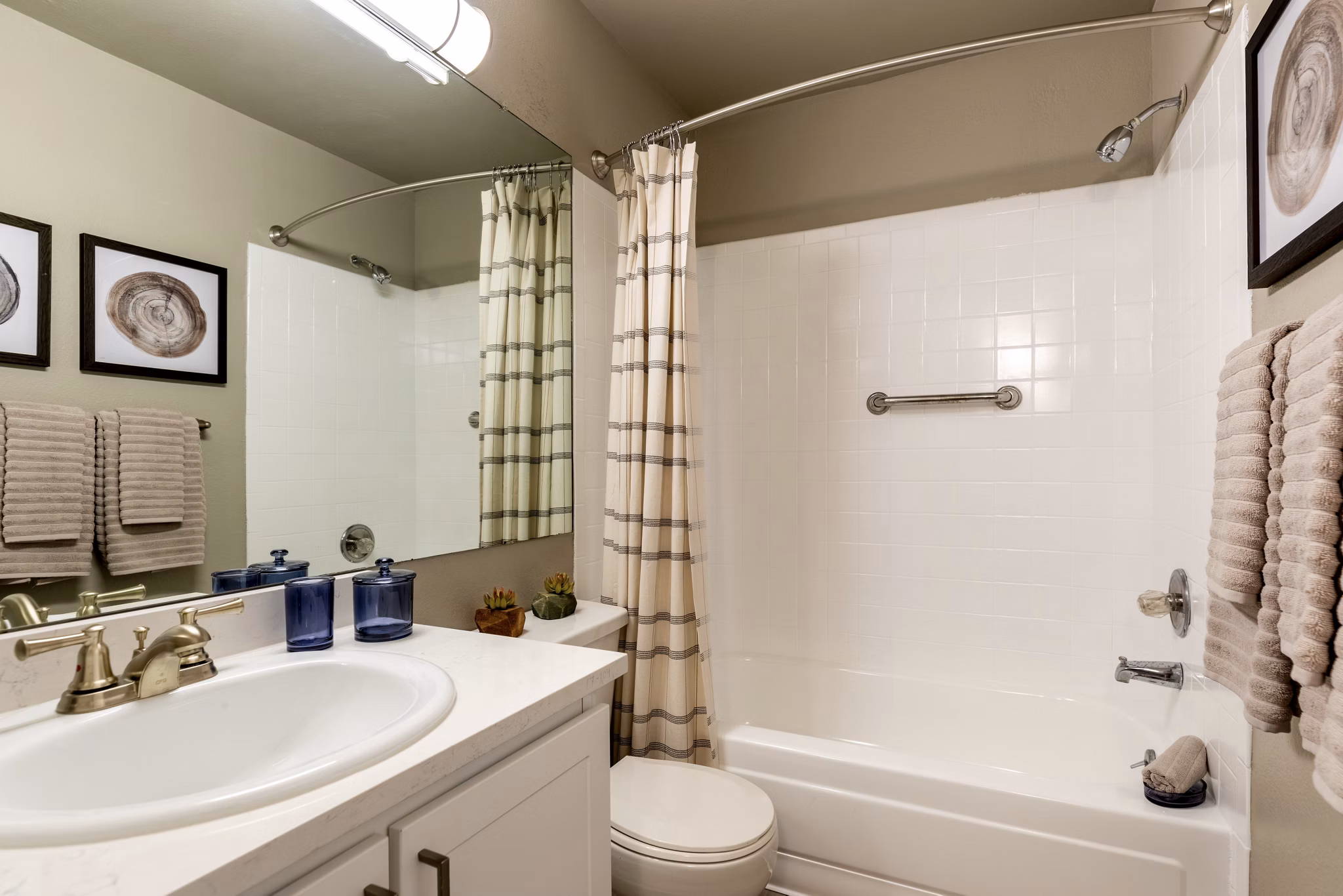Bedroom featuring elegant design and cozy furnishings at Reflections on 92nd Apartments
