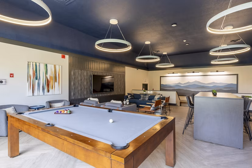 game room at Reflections on 92nd Apartments