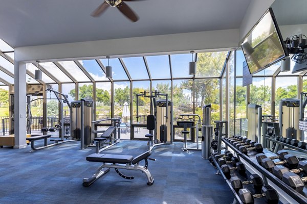 fitness center at Reflections on 92nd Apartments