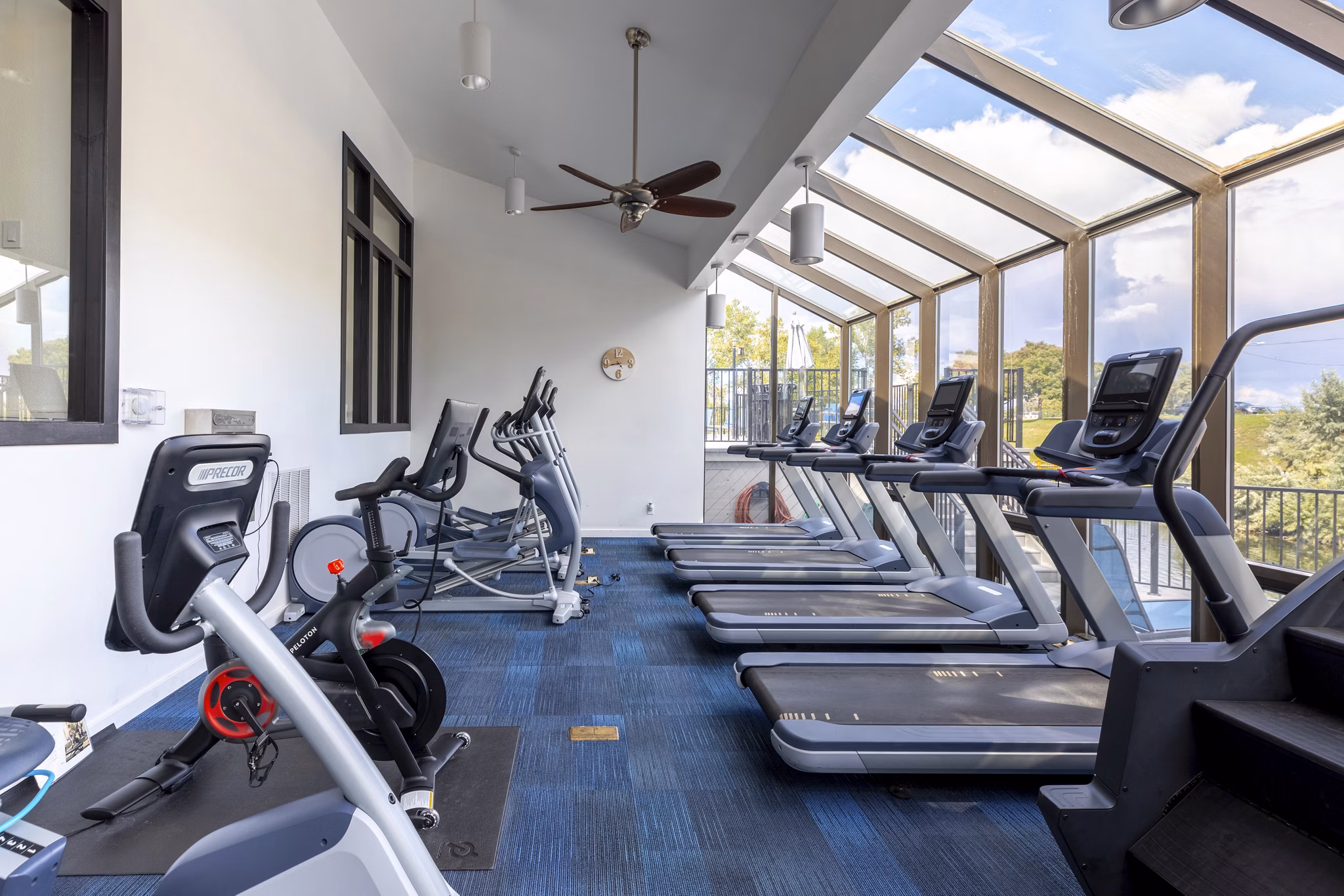 State-of-the-art fitness center with modern equipment at Reflections on 92nd Apartments