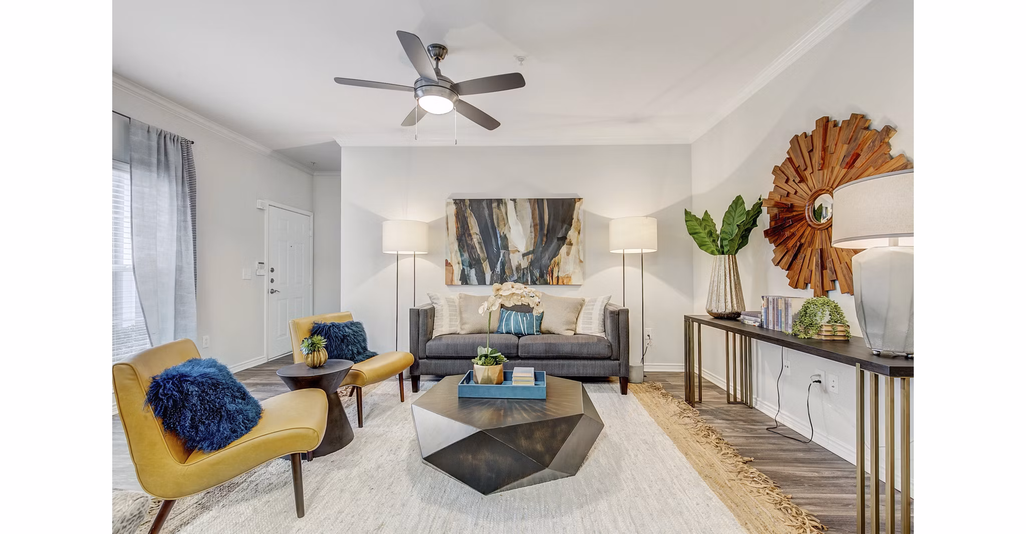Spacious living room with modern furnishings in St Marin Apartments
