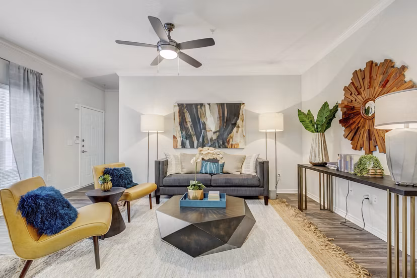 Spacious living room with modern furnishings in St Marin Apartments