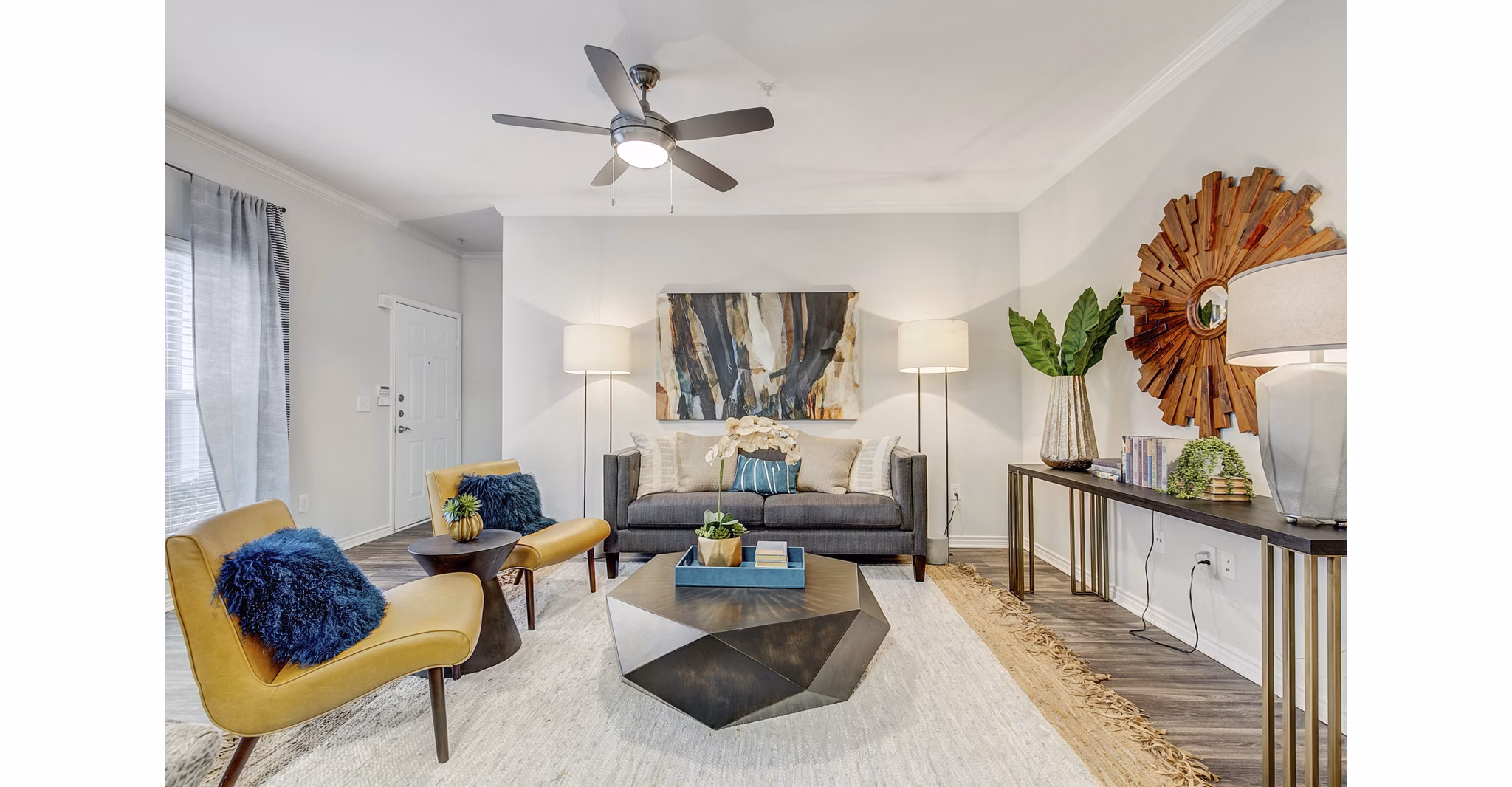 Spacious living room with modern furnishings in St Marin Apartments