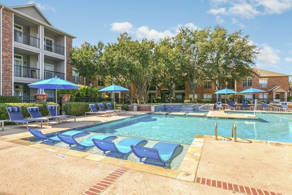 St Marin Apartments: Inviting outdoor pool area with sun lounges and lush landscaping at luxury apartments in San Rafael