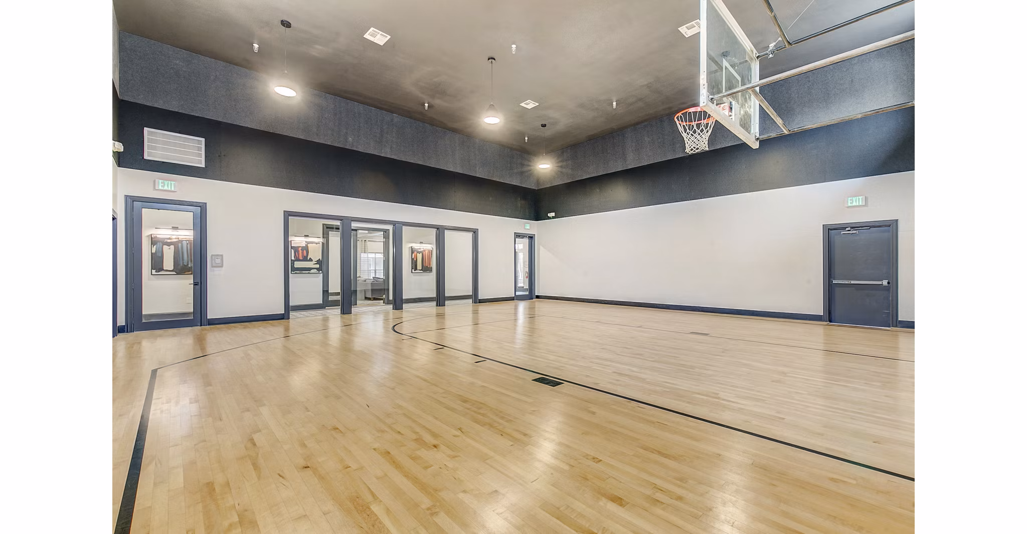 Outdoor sport court at St Marin Apartments offering tennis and basketball facilities for active residents