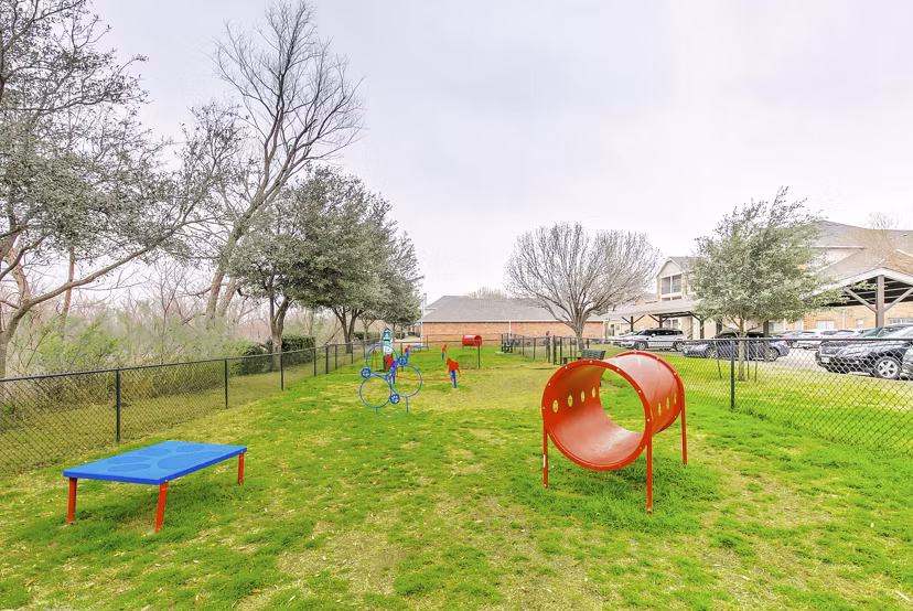 Dog park with agility course at St Marin Apartments, luxury community offering pet-friendly amenities