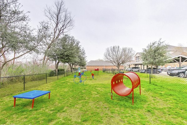 Dog park with agility course at St Marin Apartments, luxury community offering pet-friendly amenities