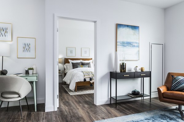 Modern bedroom with stylish decor at Lantera at Boston Landing Apartments, offering a cozy retreat in the vibrant Allston-Brighton neighborhood