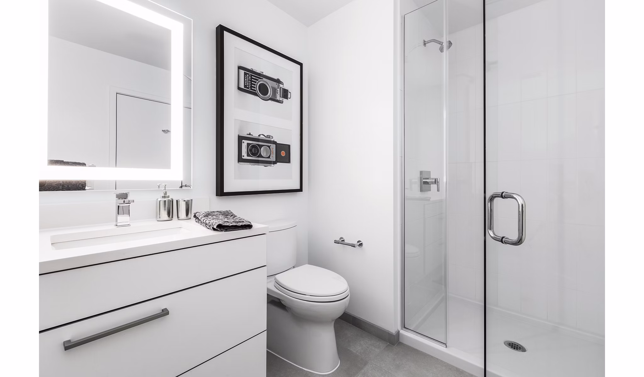 Bathroom featuring modern design and sleek fixtures at Lantera at Boston Landing Apartments