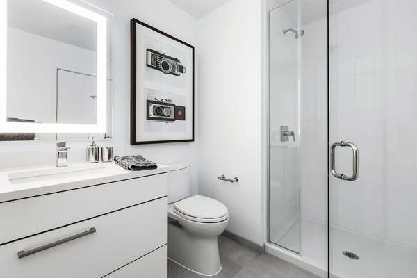 Bathroom featuring modern design and sleek fixtures at Lantera at Boston Landing Apartments